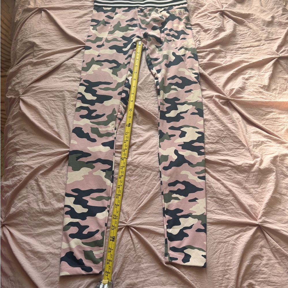 Victoria’s Secret PINK ultimate camouflage pink and green leggings.